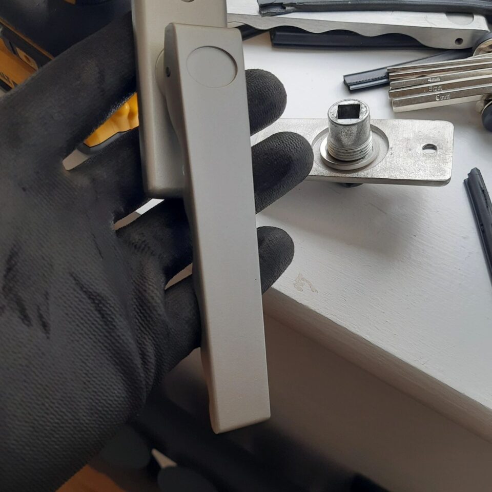 Bi-fold door handle replacement and alignment repair in Walton-on-Thames