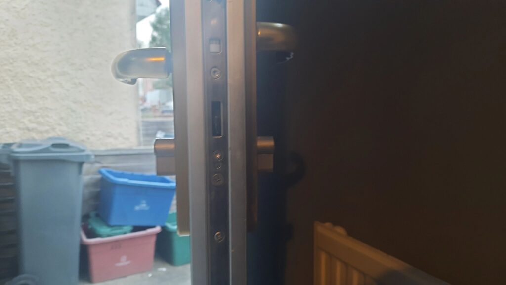 Overexposed euro cylinder on a front door in Feltham