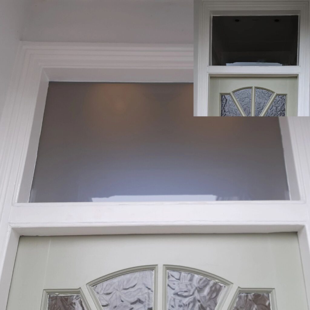 Frosted double-glazed panel installed above a wooden door in Kingston