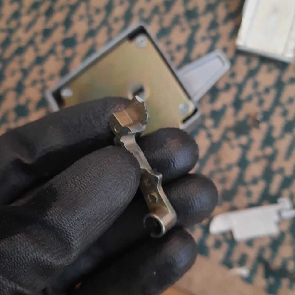Failed high-security nightlatch removed from a front door in Staines