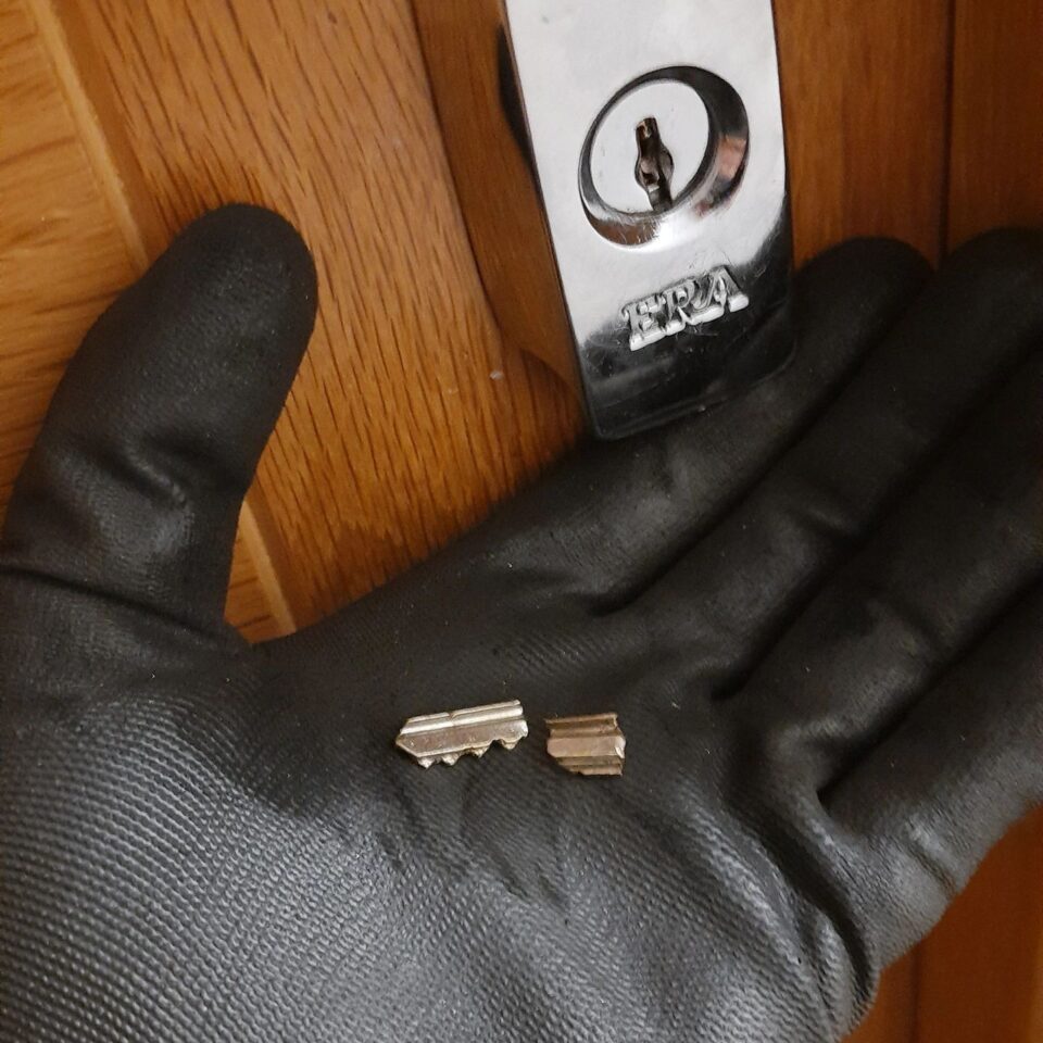 Broken key fragments removed from a door lock in Ashford