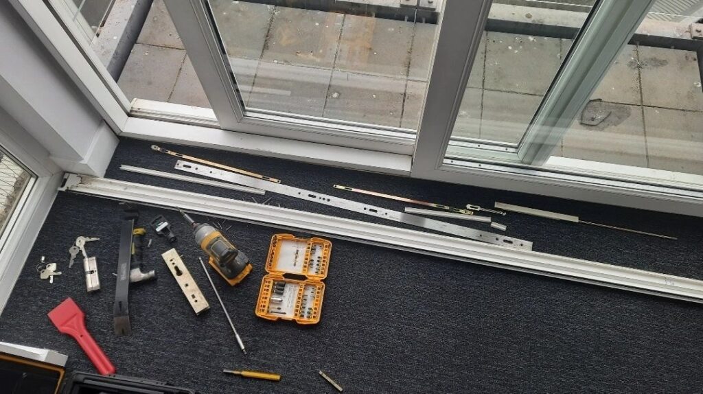 uPVC sliding door gearbox replacement and roller adjustment in Feltham